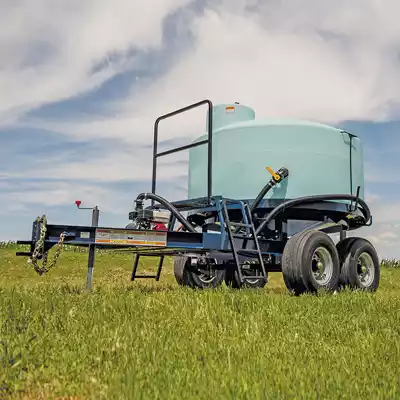 Large cone bottom nurse trailer with a rounded blue tank.