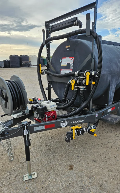 Sales Specialist reviewing a water trailer configuration with a customer