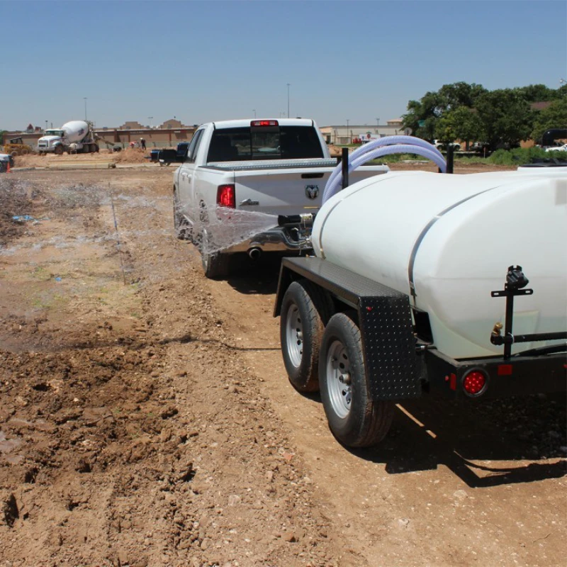 550 gallon water trailer spraying for dust control