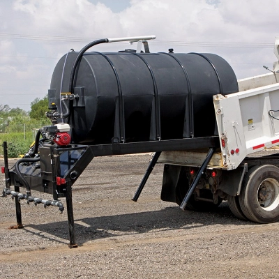 Dust Killer Auto Skid loading into dump truck bed