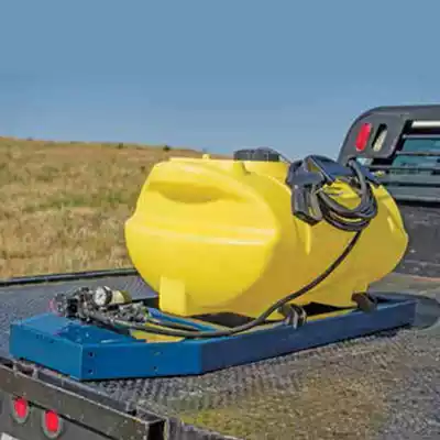 Elliptical skid sprayer tank on the back of a work truck.