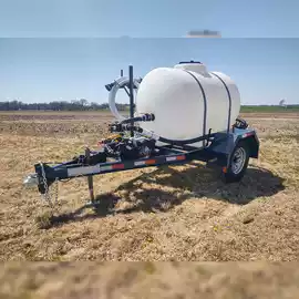 One Clarion with a white tank in the middle of a field