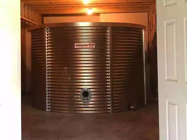 Small One Clarion corrugated tank installed in a home