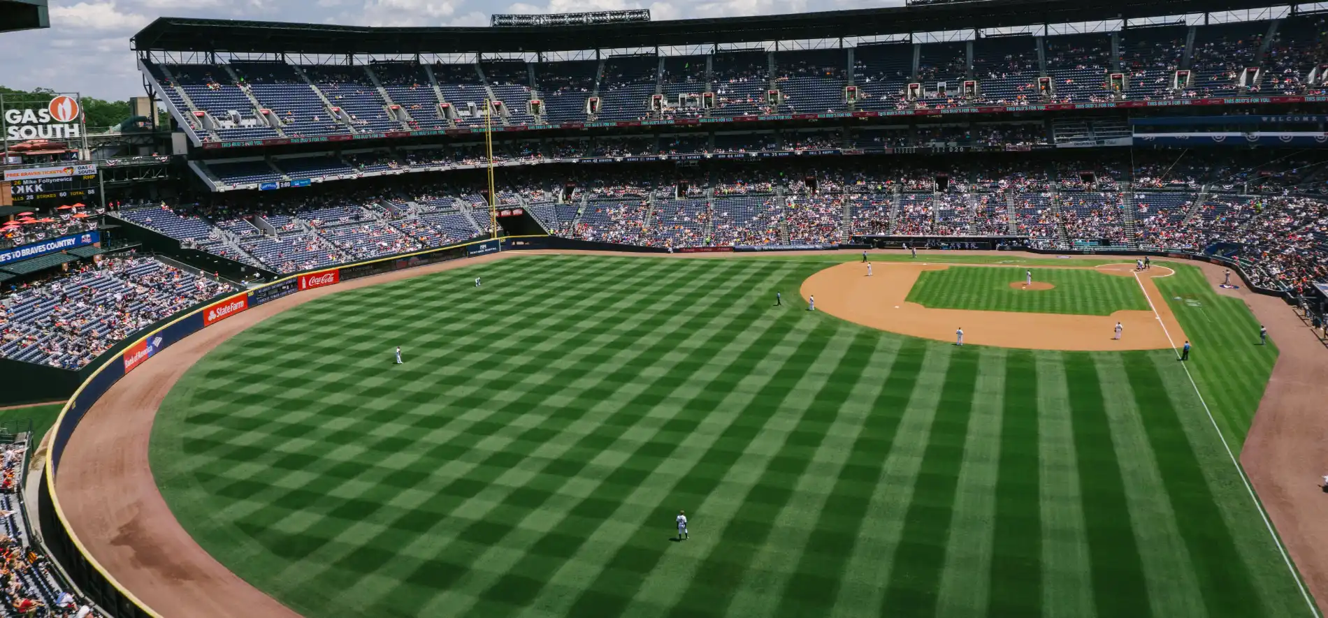 Water trailer watering a baseball infield