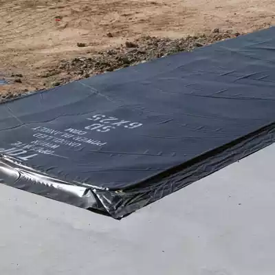 Concrete heater blanket on a pad of concrete