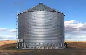 Corrrugated steel tank with a ladder and roof