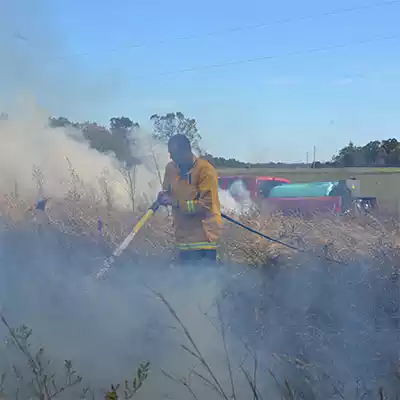 Foam Ranger Man Holding Hose Smoke